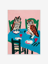 Illustrative owl wall art painting depicting two owls sitting at a dinner table with plates and cups against a pink background.
