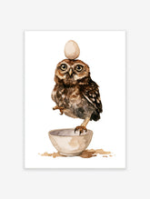 Watercolour illustration of an owl standing on a bowl and balancing an egg on its head on a white background