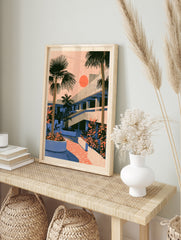 Retro architectural illustration featuring palm trees, a modernist building, and a bright, in an alternate framed mockup