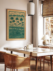 Green palm tree landscape poster with mountains and clouds in an illustrative style on a brown background. - Image 2