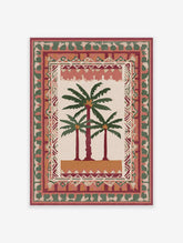 Illustrative palm tree poster with three palm trees on a beige background, surrounded by decorative tribal patterns in red, green, and orange.
