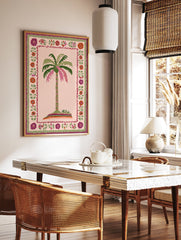 Tropical palm tree poster with pink and green fronds on an island, surrounded by a folk art floral border with red, purple, and pink flowers. - Image 2