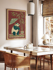 Illustrative panda holding a patterned umbrella next to potted bamboo plants on a decorative base against a red background. - Image 2