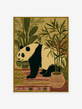 Illustrative panda wall art print with black and beige panda surrounded by green bamboo and plants in earth tone pots.