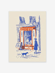 Paris street scene poster of a woman walking a blue dog on a red leash past a cafe with a red awning.