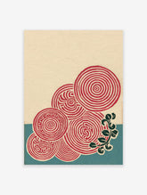 Abstract pattern art print featuring red concentric circles, maze-like patterns, and green leaves on a cream and blue background.