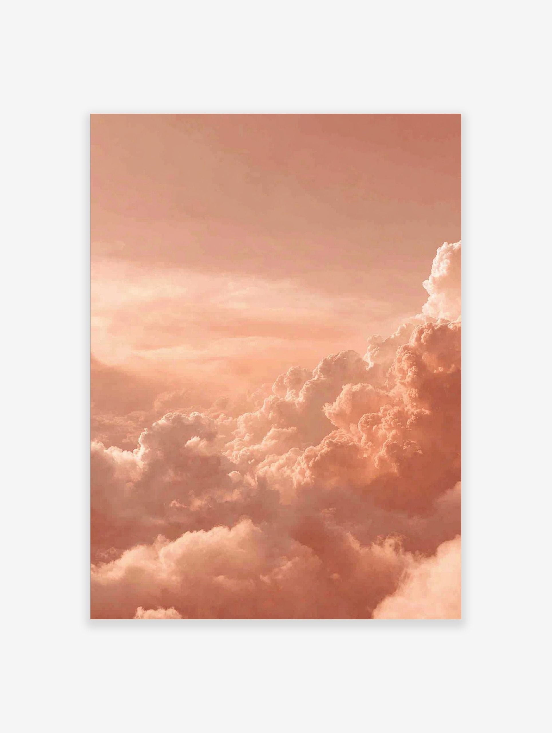 Peach and orange cumulus clouds filling the sky at sunset, a serene and dreamy photographic print