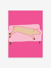 Whimsical pig wall art illustration showing a light brown pig sleeping on a light pink couch against a vibrant pink background.
