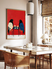 Stylised illustration of two pigeons playing cards on a small table against a solid vibrant red, in a styled room mockup