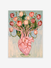Pink anatomical heart vase with red and cream tulips on pale blue background art print
