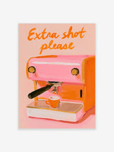 Pink espresso machine poster with orange 'Extra shot please' text and orange cup on drip tray