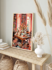 A vibrant pink library books poster showing a grand room with bookshelves, a table overflowing with books, and flowers. - Image 4