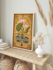 Pink lotus flower and red fish botanical illustration art print in an oval frame on a golden, in an alternate framed mockup