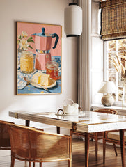 Poster of a pink Moka pot, jars of honey and butter, and white flowers on a blue table with a pink background. - Image 2