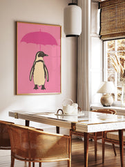 Illustrative art print of a black and white penguin with a beige belly holding a pink umbrella against a solid pink background. - Image 2