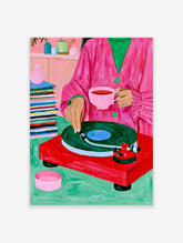Illustration of a person in a pink coat with tea and a red record player on a green surface
