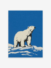 Polar Bear Wall Art illustration showing a white polar bear standing on snow against a blue background.