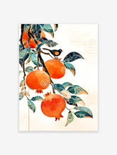 Illustrative pomegranate wall art with orange fruits, teal leaves, and a black bird on a branch against a white background.