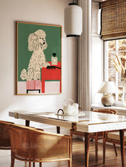 Illustrative poodle on a striped stool next to a red table with a perfume bottle and hairbrush on a, in a styled room mockup