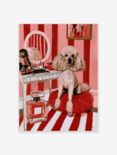 Illustrative print of a fluffy poodle on a red cushion before a vanity with a mirror and perfume bottle on pink stripes