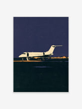 White private jet on dark runway at night with warm lights and deep blue sky