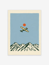 Vintage style illustration of a propeller aircraft flying over a mountain range with a red sun