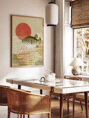 Pufferfish swimming in water with a large red sun in the background, Japanese woodblock style art, in a styled room mockup