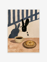 Illustration of a black and white rabbit at a table with a cup of coffee and a pastry, warm earthy tones