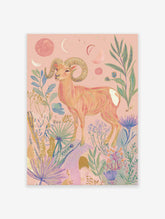 Pink ram poster with large horns, surrounded by celestial moons, stars, and botanical plants on a light pink background.