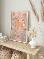 Pink ram poster with large horns, surrounded by celestial moons, stars, and botanical plants on a light pink background. - Image 4