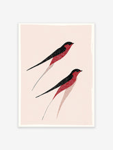 Stylized red and black bird wall art print featuring two flying swallow-like birds on a light pink background.
