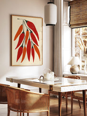 Illustrative print of ten red and orange chilli peppers with black stems on a light beige background, in a styled room mockup