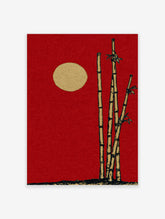 Red bamboo wall art print with three stalks and a gold moon on a deep crimson background