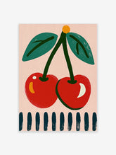 Red cherry wall art print with two cherries, teal leaves, and pink background