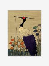 Japanese art print of a red-crowned crane with black neck, red crown, white and purple feathers, standing among reeds and