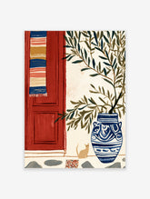 Mediterranean art print with red door, striped textile, olive branches in blue vase, and tan cat