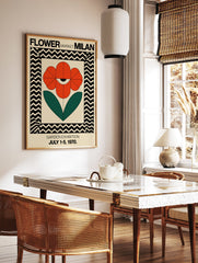 Red flower poster with an eye motif and green leaves, framed by black and cream chevron pattern, for Milan Garden Exhibition. - Image 2