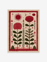 Red folk art botanical print with stylized flowers, sun, moon, and stars on a beige background.