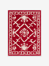 Red and white geometric floral poster with stylised blooms and Greek key border