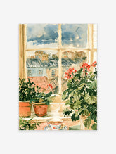 Watercolour poster of red geraniums on a windowsill with a teacup and city rooftops beyond