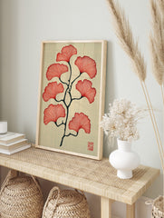 Red ginkgo leaves on a dark branch illustration on a textured beige background with a red seal, in an alternate framed mockup