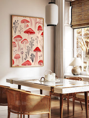Red mushroom and dark botanical illustration art print on a pale beige background, featuring, in a styled room mockup
