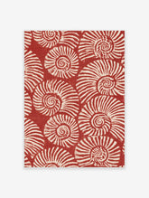 Repeating pattern of white spiralling nautilus shells on a deep red background, illustrative wall art print