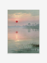 Red sun over misty lake with tree reflections and reeds in calm water art print