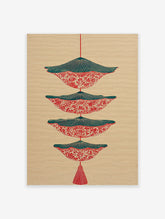 Red and teal patterned wall art print with stacked, inverted shapes and a tassel on a beige background.