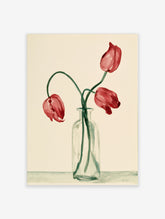 Watercolor painting of three red tulips in a clear glass vase on a neutral background