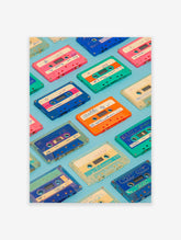 Grid of colorful retro cassette tapes on a light blue background, featuring pink, blue, green, orange, and clear vintage mixtapes.