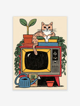 Retro cat lying on books atop a vintage TV with plants and a blue watering can