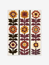 Retro floral botanical print with stylized flowers and leaves in mustard, orange, and brown on a white background