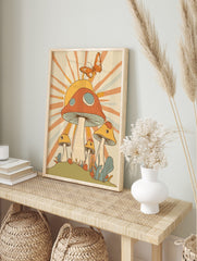 Retro illustrative art print of a large orange and yellow mushroom with smaller fungi, a, in an alternate framed mockup